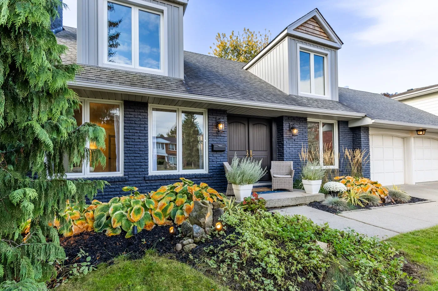 A two-storey brick home with a double garage in an established Burlington neighbourhood